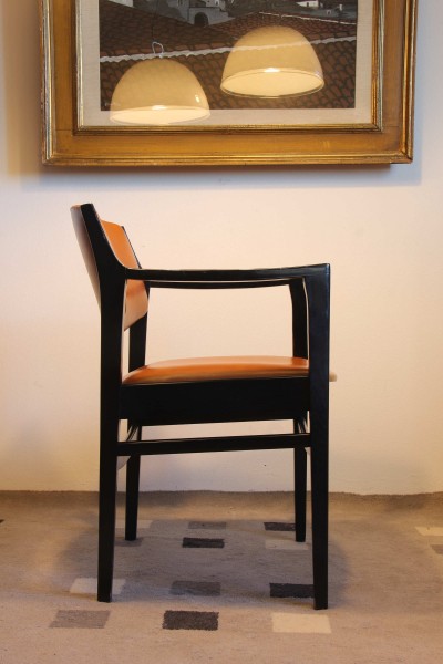 Italian armchair from the 70s in black painted wood and cognac red Sky