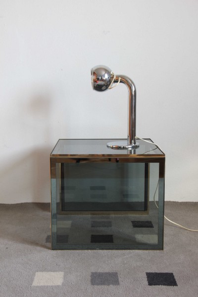 Small service table in metal and crystal with mirrored edges.