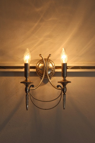 Classic  Gaetano Sciolari design wall light in nickel-plated metal from the 1980s, in good condition.