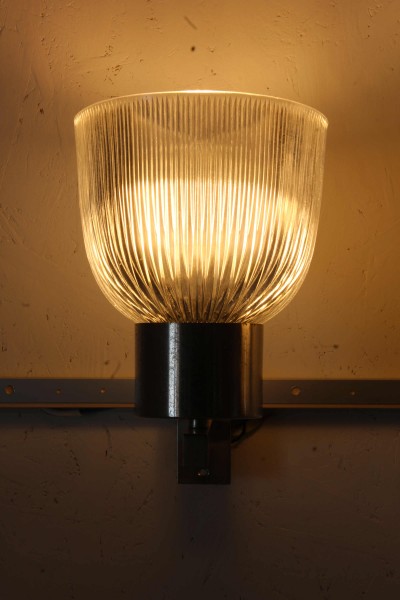 Pair of 1104 model wall lamps designed by Tito Agnoli for Oluce.
