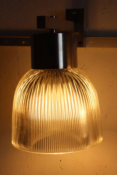 Pair of 1104 model wall lamps designed by Tito Agnoli for Oluce.