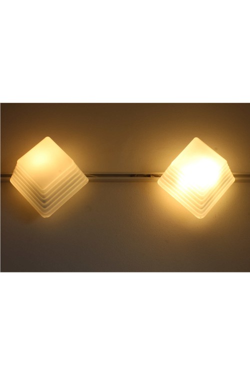 Pair of Talu 27 wall lamps produced...