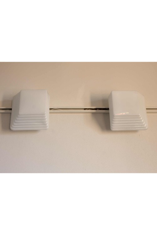 Pair of Talu 27 wall lamps produced...