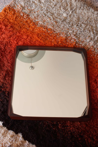 Carved wooden mirror designed by Dino Cavalli for Tredici Pavia
