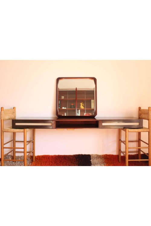 Carved wooden mirror designed by Dino...