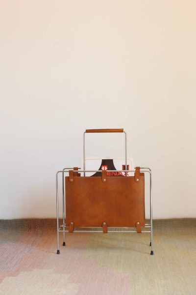 Magazine rack in chromed metal and leather, Italian production