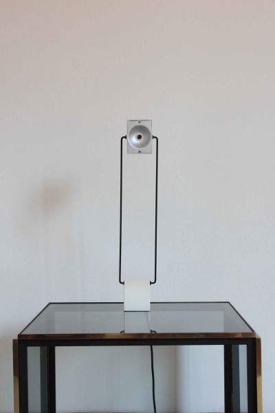Laser halogen table lamp designed by Rossari for Bilumen