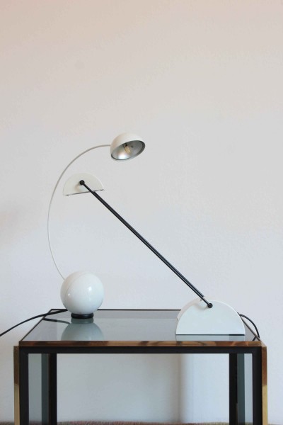Laser halogen table lamp designed by Rossari for Bilumen