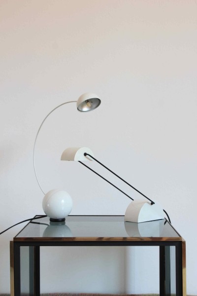 Laser halogen table lamp designed by Rossari for Bilumen
