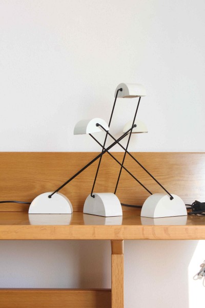 Laser halogen table lamp designed by Rossari for Bilumen