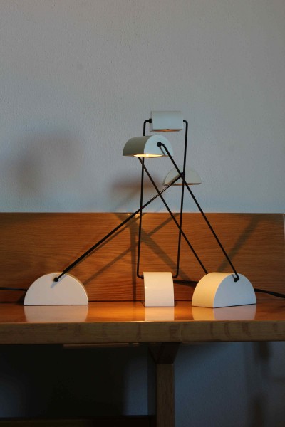 Laser halogen table lamp designed by Rossari for Bilumen