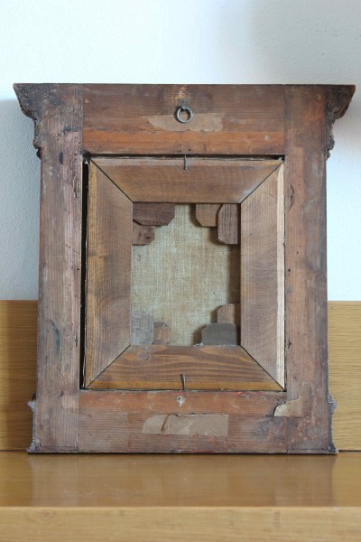Antique painting with carved frame