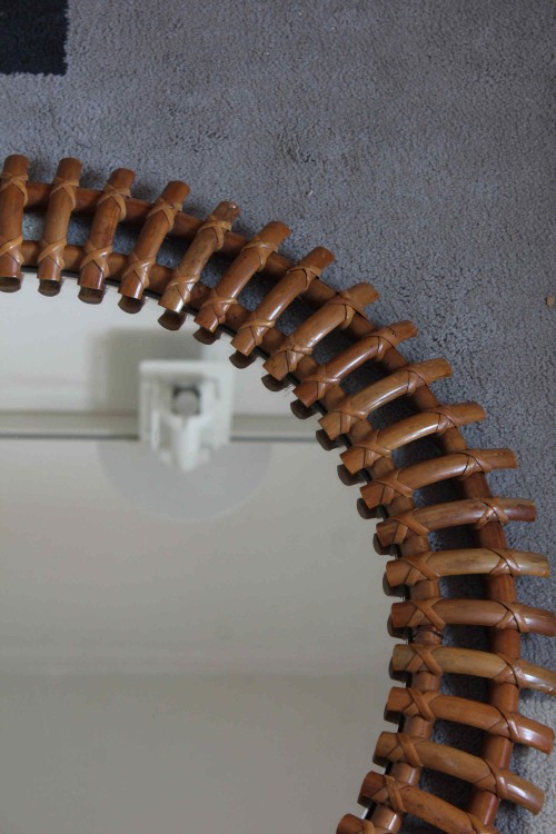 Round bamboo wall mirror in the style...