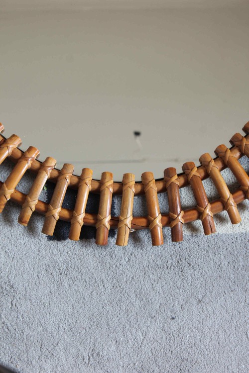 Round bamboo wall mirror in the style...