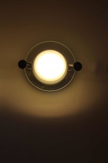 Pair of Cyclos wall sconces designed by Michele De Lucchi...