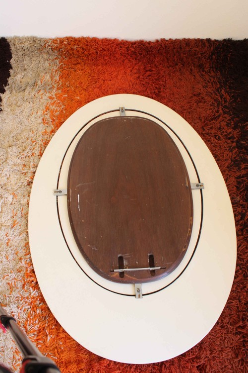 Oval mirror in cut glass produced by...