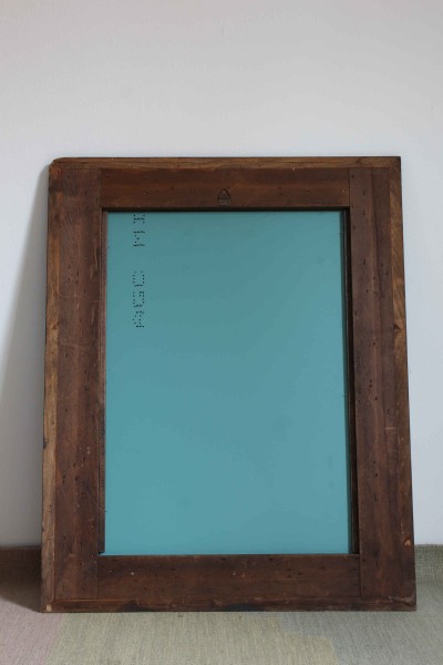 Mirror with ebonized wood frame, guilloché detail