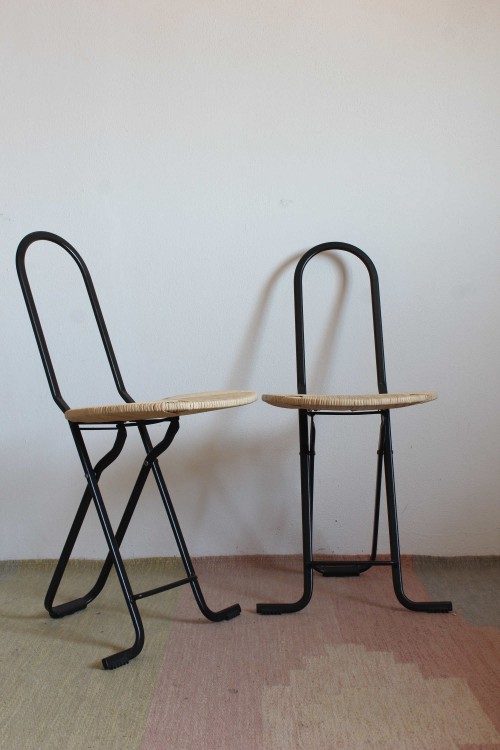 Pair of chairs in the style of...