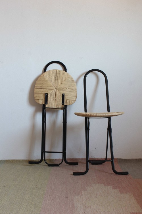 Pair of chairs in the style of...