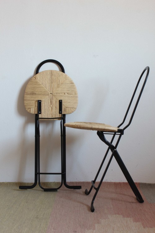 Pair of chairs in the style of...