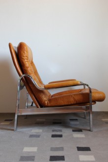 Reclining leather armchair with chromed structure, with...